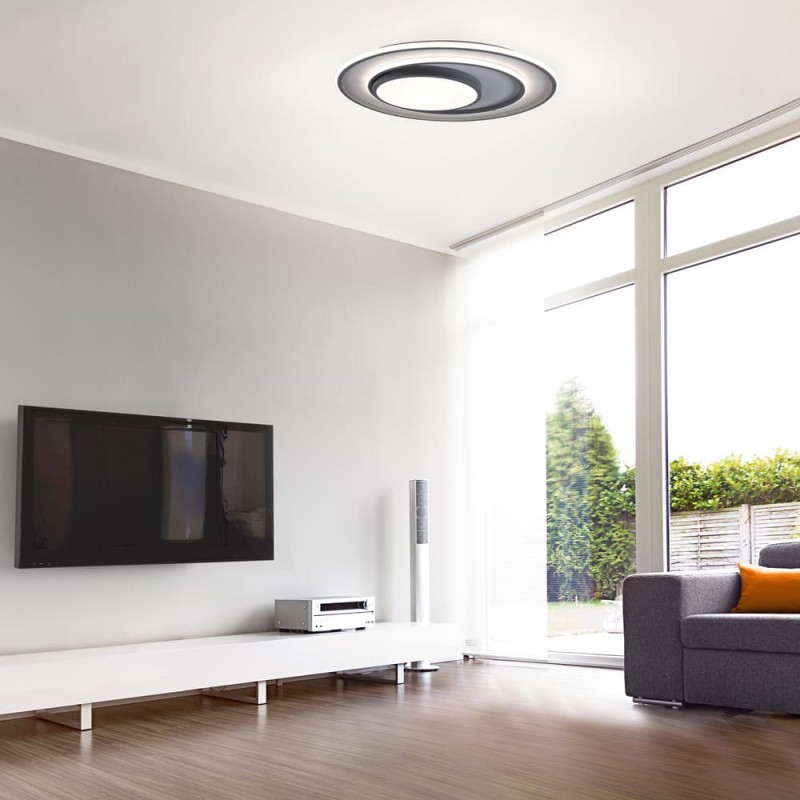 Salón moderno con Plafón LED 226W CCT Draco encendido con luz neutra.