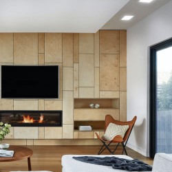 Sala de estar decorada con empotrables Know cuadrados blancos de 12 watios encendidos