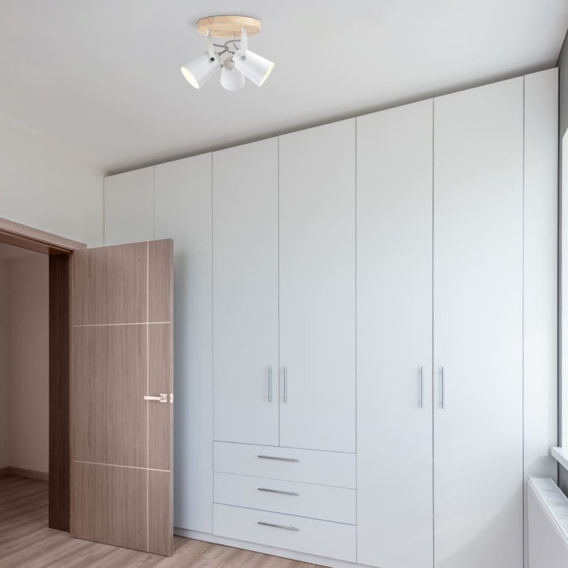 Plafón Dera redondo con tres focos decorando un dormitorio