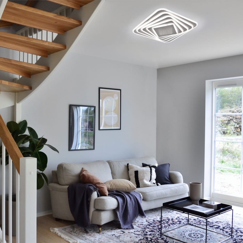 Salón decorado con Plafón Smart Mei 3D 135W 3CCT regulable encendido con luz neutra