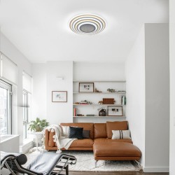 Salón decorado con el Plafón Smart Mei 3D 125W 3CCT regulable endendido con luz neutra