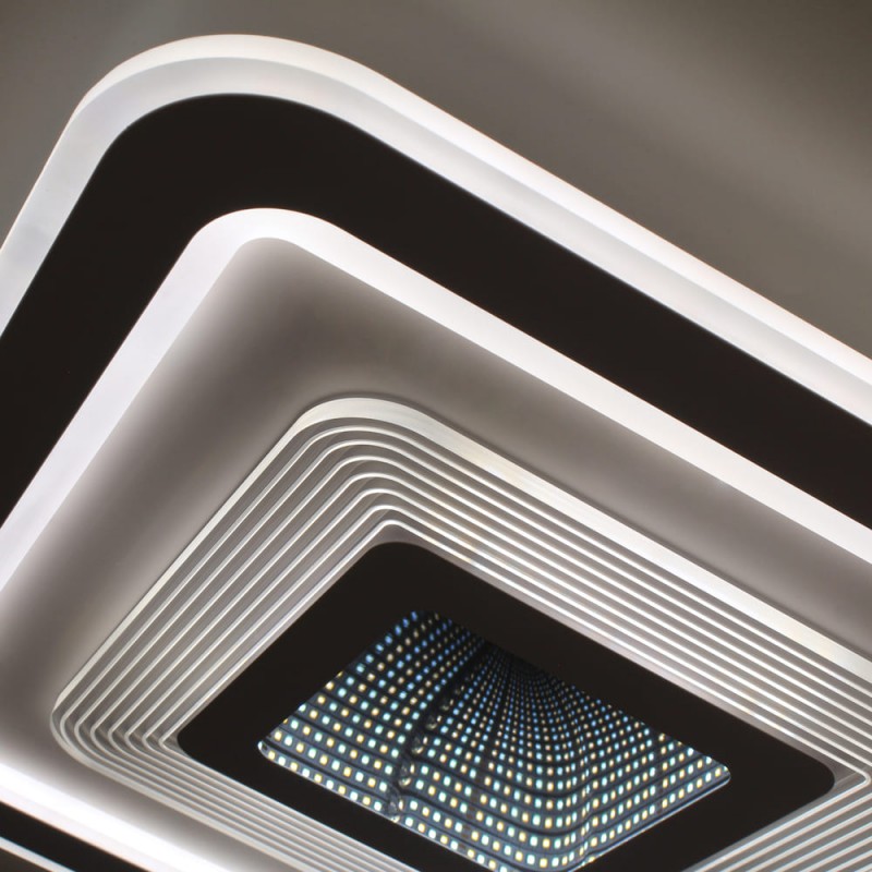 Detalle del Plafón Smart Otie 3D 90W 3CCT regulable encendido con luz combinada en tono neutro