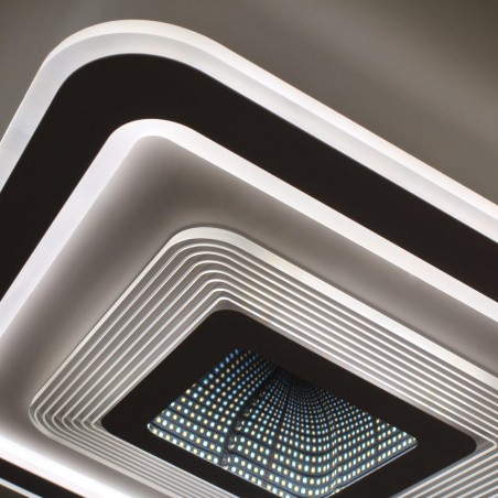 Detalle del Plafón Smart Otie 3D 90W 3CCT regulable encendido con luz combinada en tono neutro