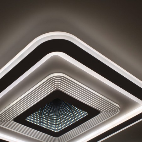 Detalle del Plafón Smart Otie 3D 90W 3CCT regulable encendido con luz combinada en tono neutro