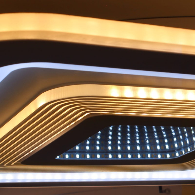 Detalle del Plafón Smart Otie 3D 90W 3CCT regulable encendido con luz combinada en tono cálido