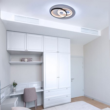 Dormitorio juvenil decorado con Plafón Smart Enyo 80W 3CCT regulable encendido con luz combinada de tono frío