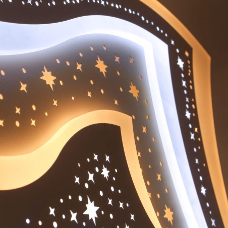 Detalle efecto estrellado del Plafón Smart Lou 105W 3CCT regulable encendido con iluminación combinada con tono de luz cálido